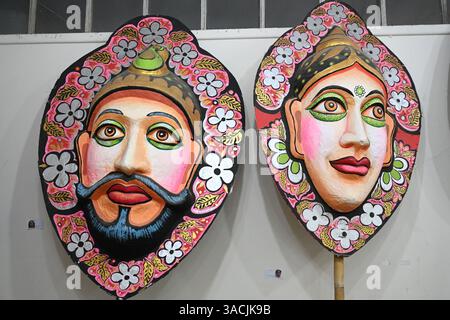 Student of Faculty of Fine arts of Dhaka University painting masks for colorful preparation to celebrate upcoming Bengla New Year 1432 in Dhaka, Bangladesh, on April 04, 2025. Pahela Baishakh (the first day of the Bangla month) can be followed back to its origins during the Mughal period when Emperor Akbar introduced the Bangla calendar to streamline tax collection while in the course of time it became part of Bengali culture and tradition. Stock Photo