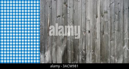 Grey rustic wooden background with old boards and blue and white checkered tablecloth pattern Stock Photo