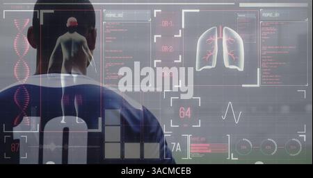 Image of digital interface with medical data processing over rugby players Stock Photo