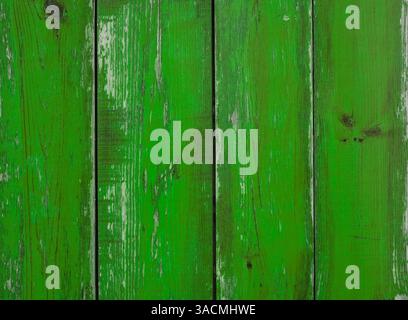 Green weathered old wooden wall with wooden boards as a wooden background with wooden boards Stock Photo