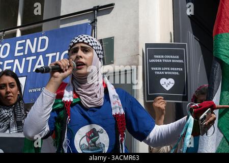 London, UK. 4 April, 2025. Supporters of Dr Swee Chai Ang, orthopaedic surgeon and founder member of Medical Aid for Palestinians, rally outside the London HQ of the British Medical Association (BMA) following the BMA withdrawing an invitation for her to speak at the annual Medical Students Conference. Swee Chai, 76, survived the Sabra-Shatila massacre in 1982 during the Israeli invasion of Lebanon and later founded Medical Aid for Palestinians, where she has volunteered ever since. She accused the BMA of "shutting down" free speech. Credit: Ron Fassbender/Alamy Live News Stock Photo