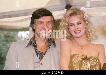 Hugh Hefner awards Dorothy Stratten Playboy Playmate of the Year, 1979