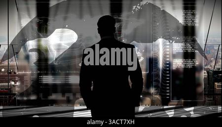 Image of businessman over information and data processing on interface Stock Photo
