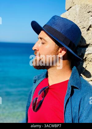 Thoughtful Man on the Sea, Large Portrait Stock Photo