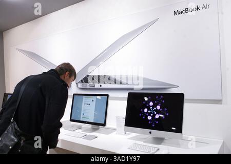 Nov. 12, 2011 - St Petersburg, Russia - MacBook Air stand at the newly opened iPort store. an Apple Premium Reseller iPort store opened in St. Petersburg, Russia. Apple iPort store are 'monobranded' stores, resellers who offer shoppers a premium shopping experience. (Credit Image: © PhotoXpress/ZUMAPRESS.com) Stock Photo