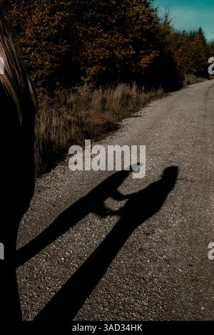 Pregnant couple silhouettes Stock Photo - Alamy