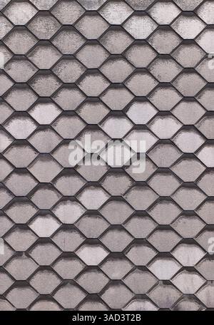 Full frame close-up view of a grey concrete hexagonal pavement creating a repeating geometrical pattern.Belarus Stock Photo
