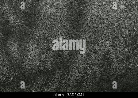 Dark green textured background forming an abstract pattern with small bubbles, ideal for design projects, websites, or presentations.Belarus Stock Photo
