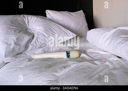 Cordless wand vibrator resting on an unmade hotel bed; travel companion for self-pleasure; masturbation Stock Photo - Alamy Cordless wand vibrator resting on an unmade hotel bed; travel companion for self-pleasure; masturbation Stock Photo - Alamy