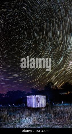 star trail over the field Stock Photo