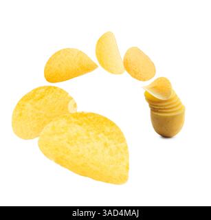 Raw potato slices transforming into crispy chips in air on white background Stock Photo