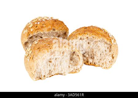 Crispy bread rolls with oat isolated on white background. Fresh crispy bread rolls pieces on white. Stock Photo