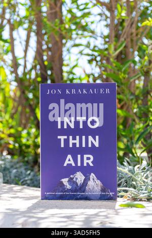 Close-up of Jon Krakauer's Into Thin Air Book in The Garden. Stock Photo