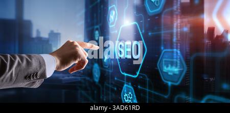 Businessman's fingers pressing a button SEO. Search engine optimization. Stock Photo