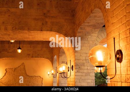 vintage edison light bulb on the wall for decoration, cafe interior Stock Photo