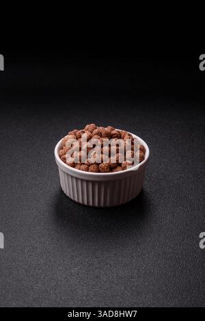 Cereal chocolate corn balls in a bowl. Delicious, healthy breakfast balls Stock Photo