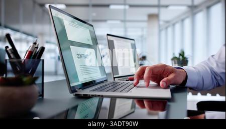 Reading Lease Agreement Contract Document On Laptop Computer Stock Photo