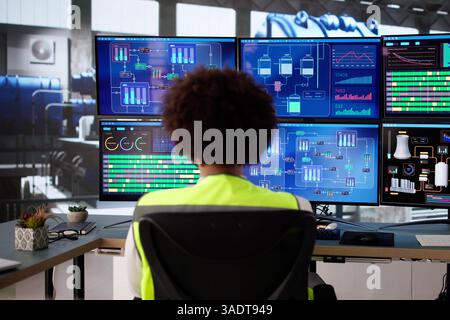 Checking the Heating Pipes, the Power Plant Engineer Works Stock Photo