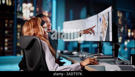Architect analyzing house floor plan for property renovation project.   Interior designer using CAD software to remodel real estate space. Stock Photo