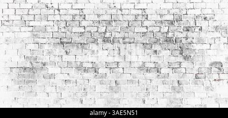 white brick wall, masonry pattern of painted stone and concrete .brick wall painted white, abstract background for inserting text Stock Photo