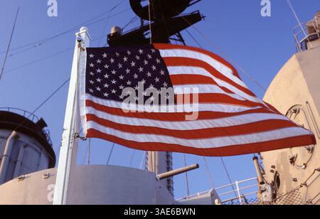 Oct 12, 2001; Quincy, MA, USA; The Stars & Stripes fly from the deck of the USS Salem, in Quincy. Ordered by the US Navy on 14 June, 1943, USS Salem (CA 139) was laid down on 4 July, 1945 @ the Bethlehem Steel Company's Quincy Yard & launched on 25 March, 1947. She was commissioned at the Boston Navy Yard on 14 May, 1949..  (Credit Image: Seamas Culligan/ZUMAPRESS.com) Stock Photo
