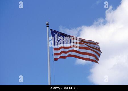 Mar 12, 2002; Quincy, MA, USA; The Stars & Stripes flies proudly over the USS Salem in the Quincy Shipyard in Massachusetts. Ordered by the US Navy on 14 June, 1943, USS Salem (CA 139) was laid down on 4 July, 1945 at the Bethlehem Steel Company's Quincy Yard in Quincy, MA and launched on 25 March, 1947. She was commissioned at the Boston Navy Yard on 14 May, 1949..  (Credit Image: Seamas Culligan/ZUMAPRESS.com) Stock Photo