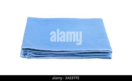 New folded terry blue towel isolated on white. Stock Photo