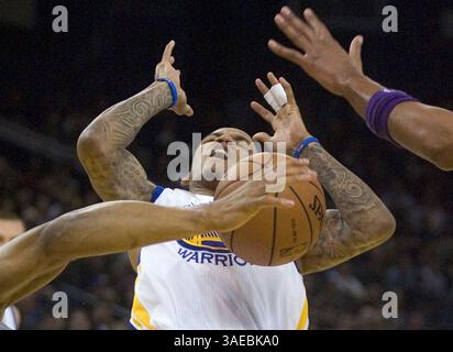 Feb. 13, 2012 - Oakland, CA, USA - In a sea of hands, Golden State Warriors point guard Monta Ellis loses his grip on the ball during the first quarter of an NBA basketball game, Monday, February 13, 2012 at Oracle Arena in Oakland, California. (Credit Image: © D. Ross Cameron/Contra Costa Times/MCT/ZUMAPRESS.com) Stock Photo