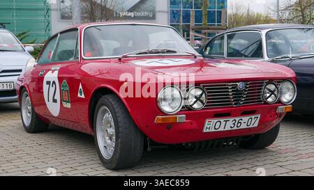 A red alfa romeo alfetta on display at the rally Stock Photo - Alamy