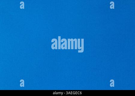 Blue tinted paper texture background. Color paper swatch. Material for handicrafts. Subtle texture. Stock Photo