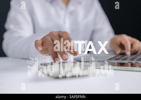 Tax documents and savings, Submit request refund tax, Businesswoman calculates taxes using calculator and tablet, Represent the concept of tax return Stock Photo