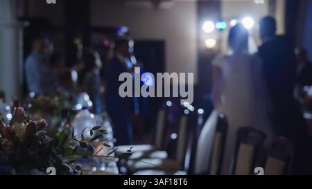 Guests at a wedding party and banquet in the restaurant premises. Stock Photo
