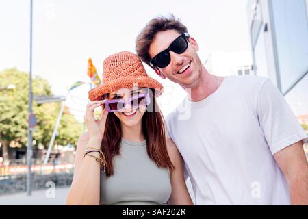young couple smiling happy looking at camera Stock Photo