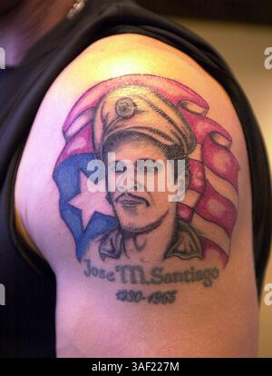 Jun 15, 2001; San Francisco, CA, USA; Catcher Benito Santiago (cq) for the San Francisco Giants has two tattoos that remember his father Jose who died when Santiago was young.  Photo taken on Friday, June 15, 2001 in San Francisco, Calif. Stock Photo