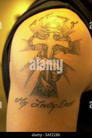 Jun 15, 2001; San Francisco, CA, USA; Catcher Benito Santiago (cq) for the San Francisco Giants has two tattoos that remember his father Jose who died when Santiago was young.  Photo taken on Friday, June 15, 2001 in San Francisco, Calif. Stock Photo