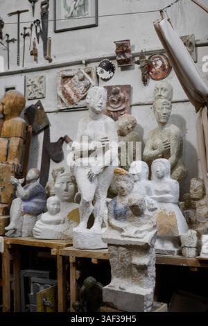 An Eclectic Collection of Stunning Sculptures and Unique Artifacts Displayed in a Creative Studio Stock Photo