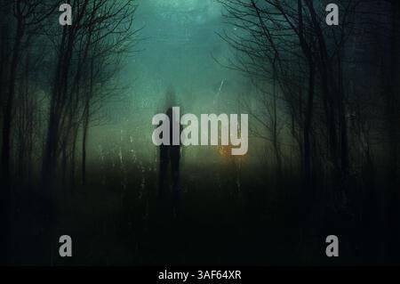 A horror edit of a hooded ghost like figure vanishing in a wood on a spooky foggy night, with a grunge edit Stock Photo