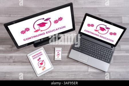 Continuing education concept shown on different information technology devices Stock Photo