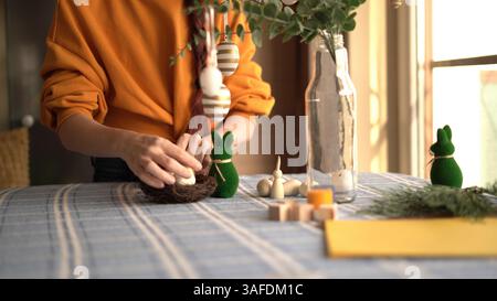 Easter Decorations on a Sunlit Table Stock Photo