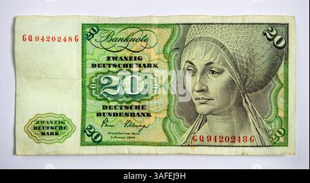 Still life of a now obsolete German 20 Deutsche Mark bank note. Also known as the Deutschmark, the currency was used until 2002. Stock Photo