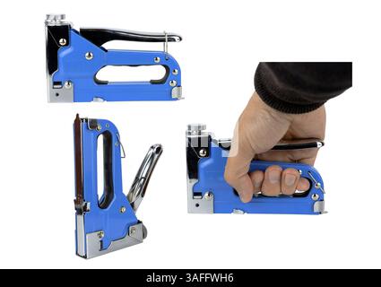 Metal construction stapler with blue body, in hand on white isolated background. There is a contour Stock Photo