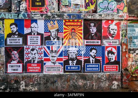 Political paste-up street art in Shoreditch, London.  2025 by artist Subdude - featuring Trump, Farrago, Musk, Putin, Zelenskyy, King Charles & more Stock Photo