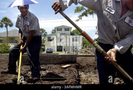 Photo 1 of 1. Employees with Aaron Concrete do prep work for a slab to be poured for an elevator shaft of a 4,000 square foot house being constructed on Old Post Road. In the neighborhoods west of U.S. 19 several large homes have been built or are under construction, brining new tax revenue to the city and boosting property values. ..Description .The housing development trend has not escaped Port Richey, especially in the neighborhoods west of U.S. 19. Several large homes have been built or are under construction, brining new tax revenue to the city and boosting property values. We take a look Stock Photo