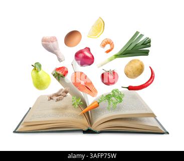 Fresh ingredients in air over recipe book on white background Stock Photo