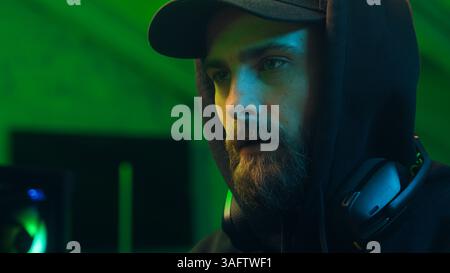 Programmer man keyboard computer typing hacker internet networking online professional software cyber tech security pc web coding browsing gaming Stock Photo