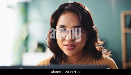 Remote work, laptop and woman with reading in home for story development, article proofreading and online research. Entrepreneur, freelance writer or Stock Photo