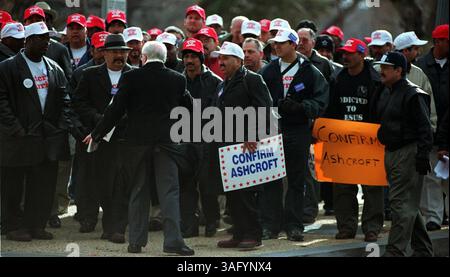 Demonstrators/supporters gather outside the Russell Senate Office building to greet John Ashcroft on his way into the Russell Senate Office building for his confirmation hearing. (Credit Image: The Washington Times/ZUMAPRESS.com) Stock Photo