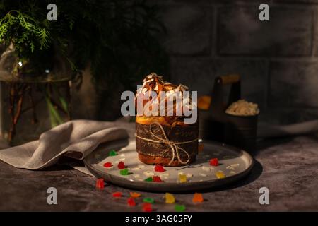 Easter craffin with nuts and candied fruits. Easter holiday. Easter cupcake on dark background Stock Photo
