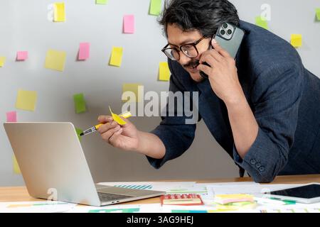 businessman with the best idea on sticky note Stock Photo