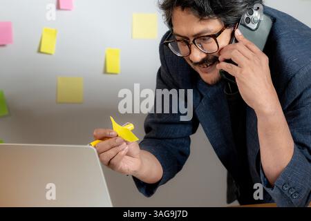 businessman with the best idea on sticky note Stock Photo